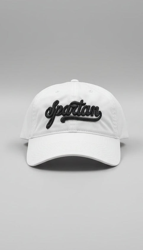 White Nike cap with 'Spartan' logo on a gray background
